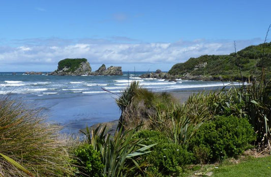 Surf and Hike in Tauranga Bay near Westport