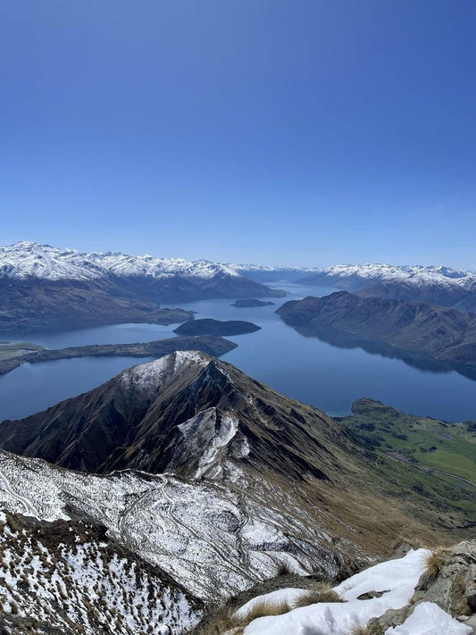The summit of Roys Peak in wanaka - an accessible day hike to do in new zealand, great at sunrise
